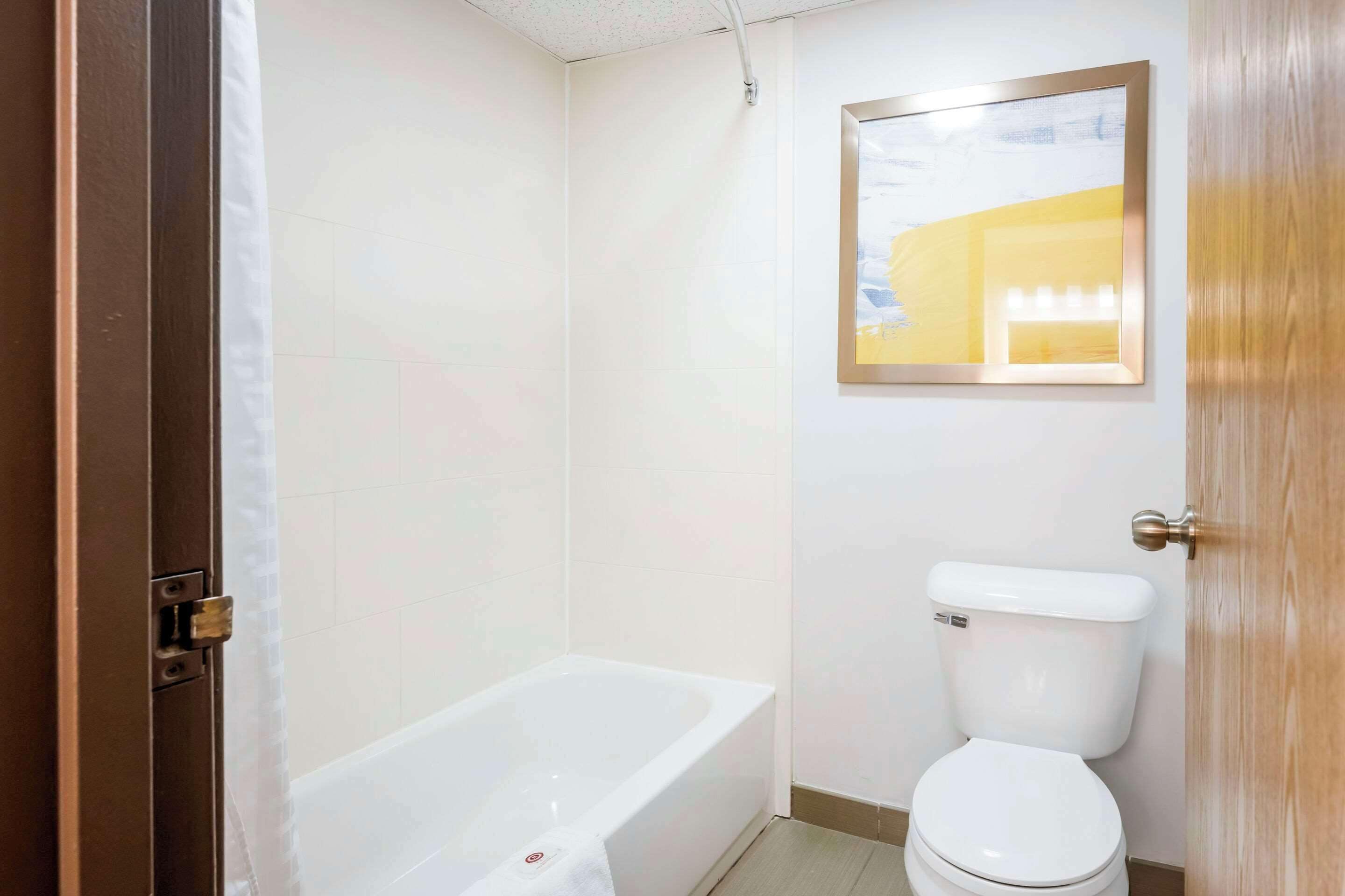 standard room, 2 queen beds, non smoking | premium bedding, desk, blackout curtains, iron/ironing board