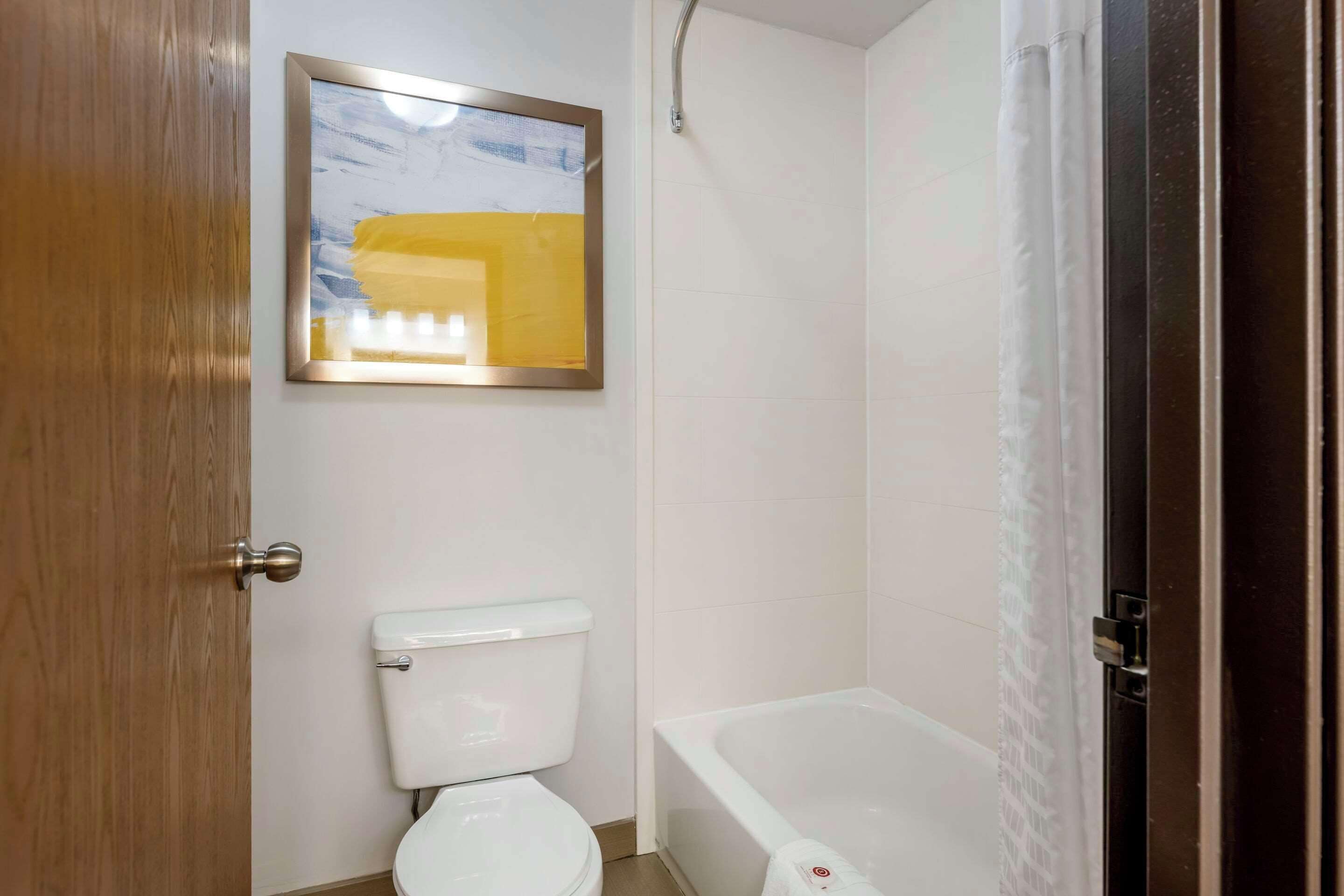 room, 1 king bed, non smoking | premium bedding, desk, blackout curtains, iron/ironing board