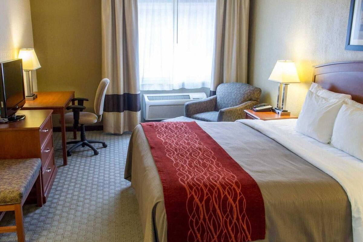 Premium bedding, desk, blackout drapes, iron/ironing board