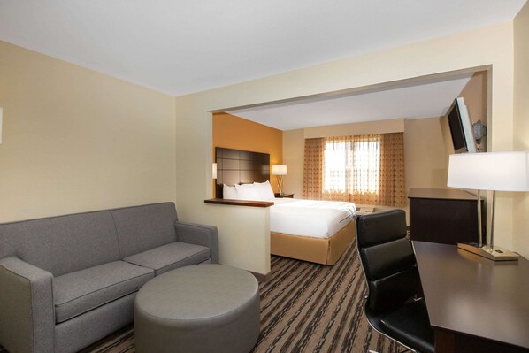 Suite, 1 King Bed, Non Smoking | Premium bedding, desk, blackout curtains, iron/ironing board