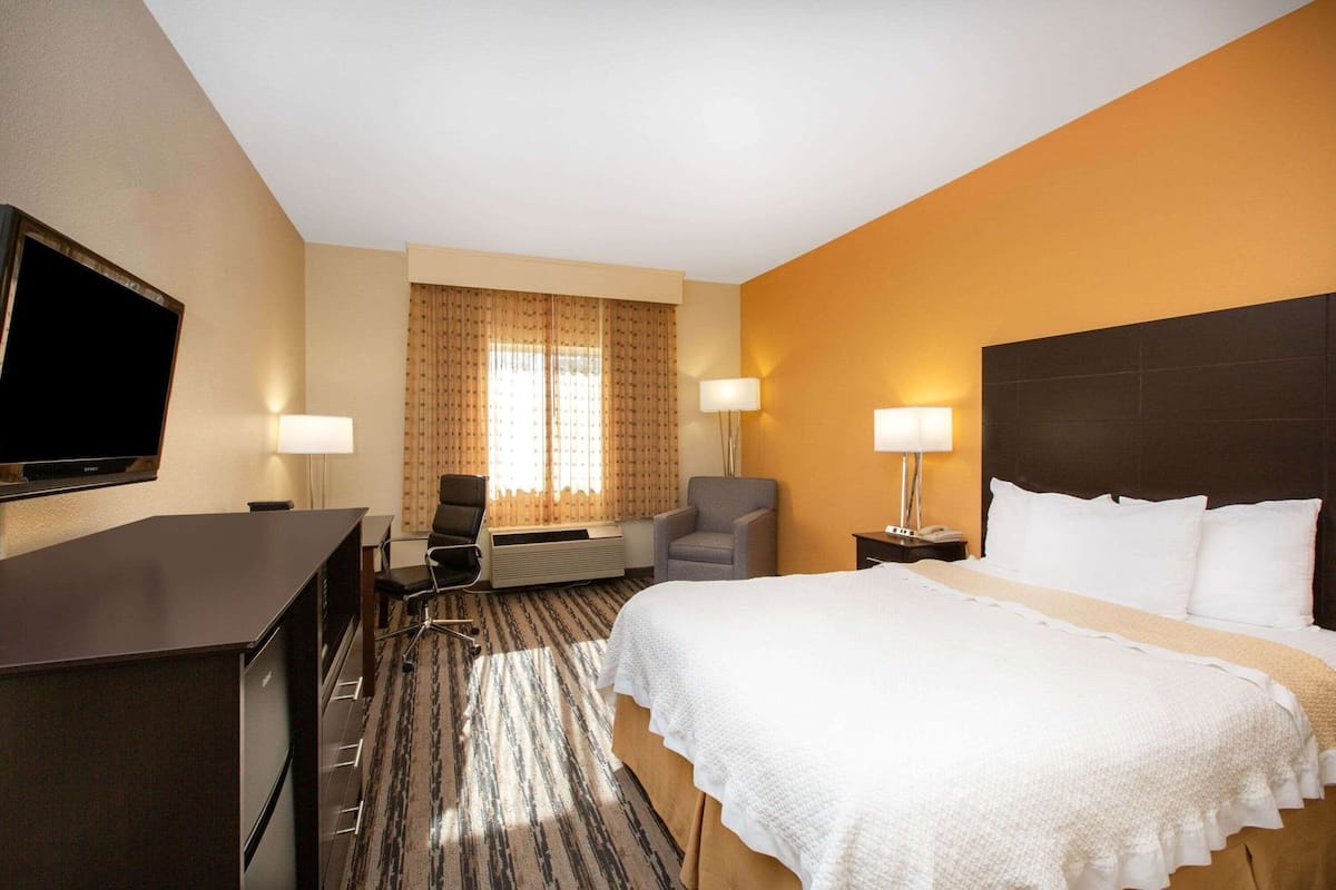 Premium bedding, desk, blackout drapes, iron/ironing board