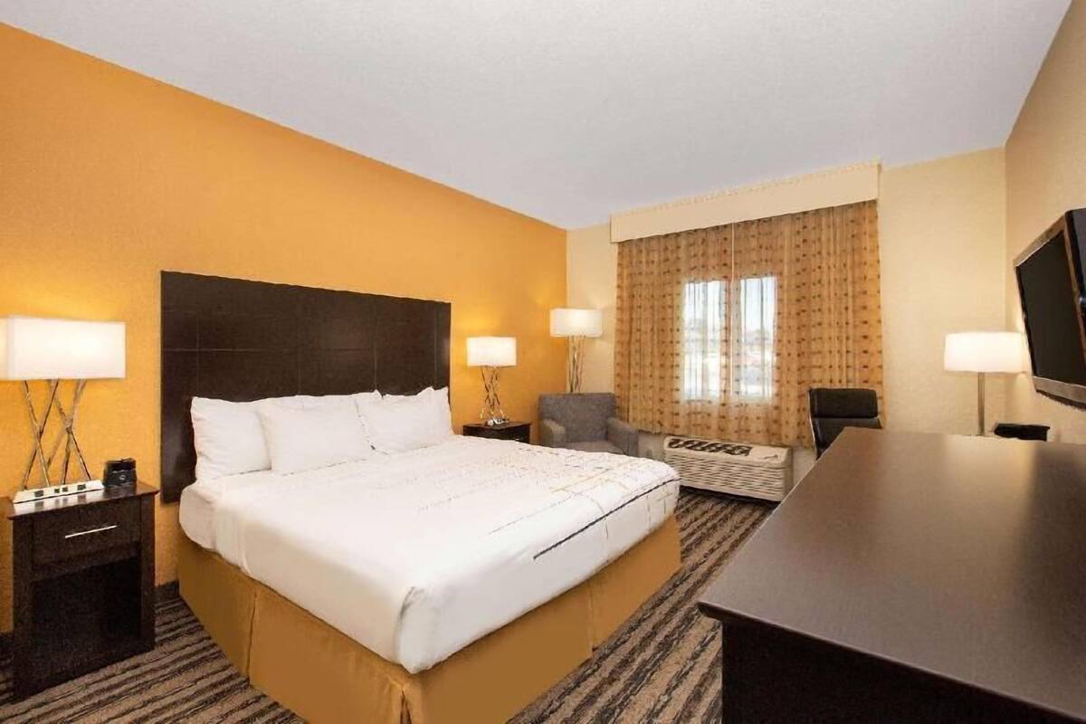 Premium bedding, desk, blackout drapes, iron/ironing board