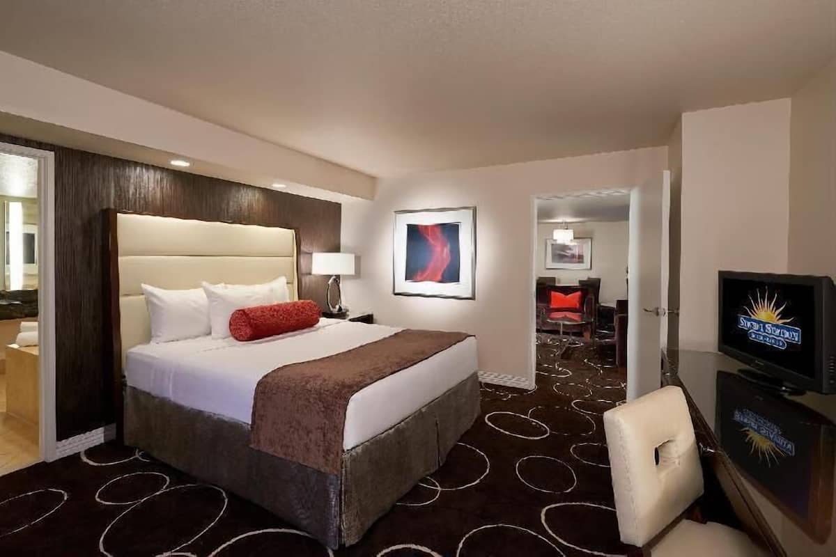 Pillow-top beds, laptop workspace, blackout curtains, iron/ironing board