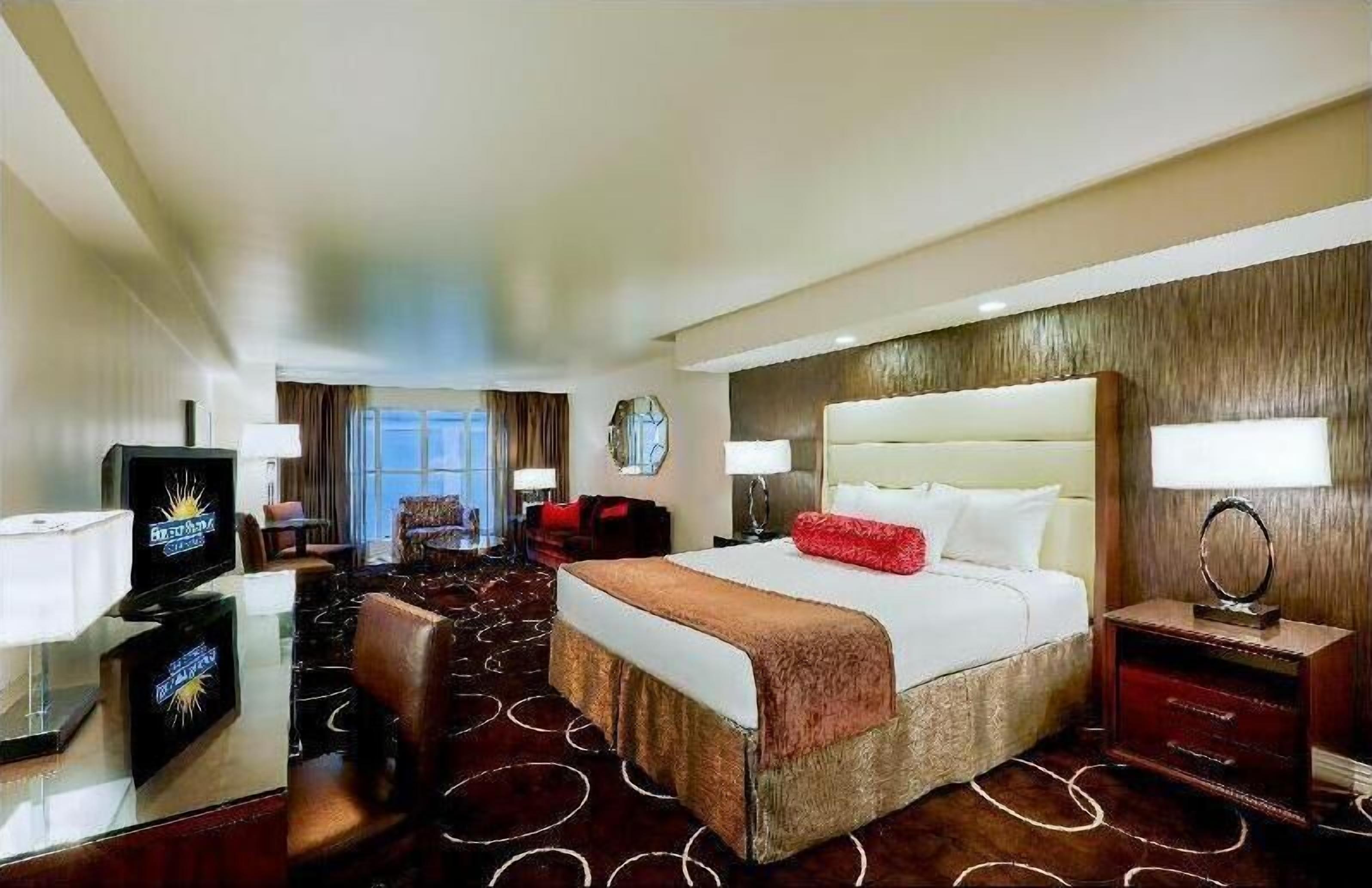 Pillow-top beds, laptop workspace, blackout curtains, iron/ironing board