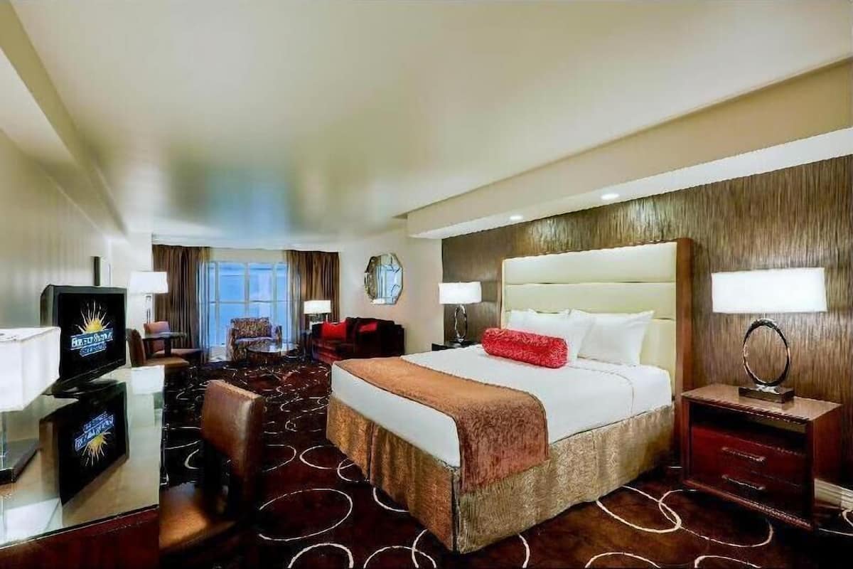 Pillow-top beds, laptop workspace, blackout curtains, iron/ironing board