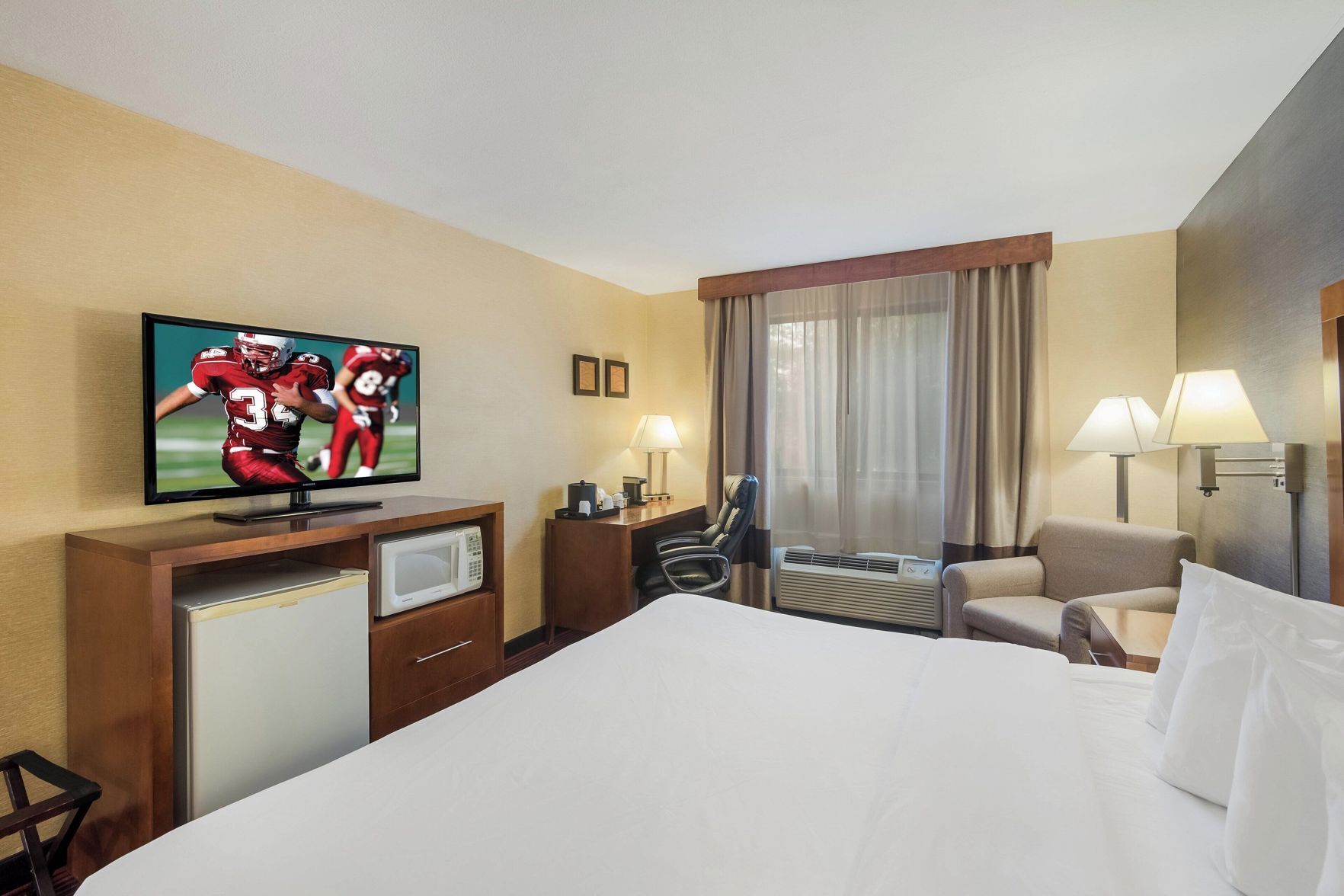 Desk, blackout drapes, iron/ironing board, rollaway beds