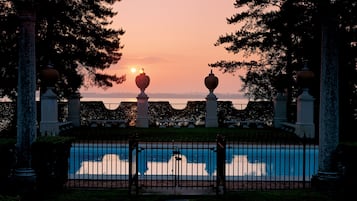 Seasonal outdoor pool, pool umbrellas, pool loungers