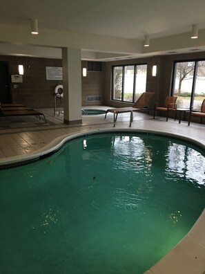 Indoor pool, open 6 AM to 11 PM, pool loungers