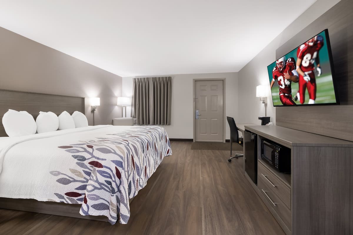 Habitación superior, 1 cama King size, para no fumadores | Escritorio, espacio para trabajar con laptop y cortinas blackout
