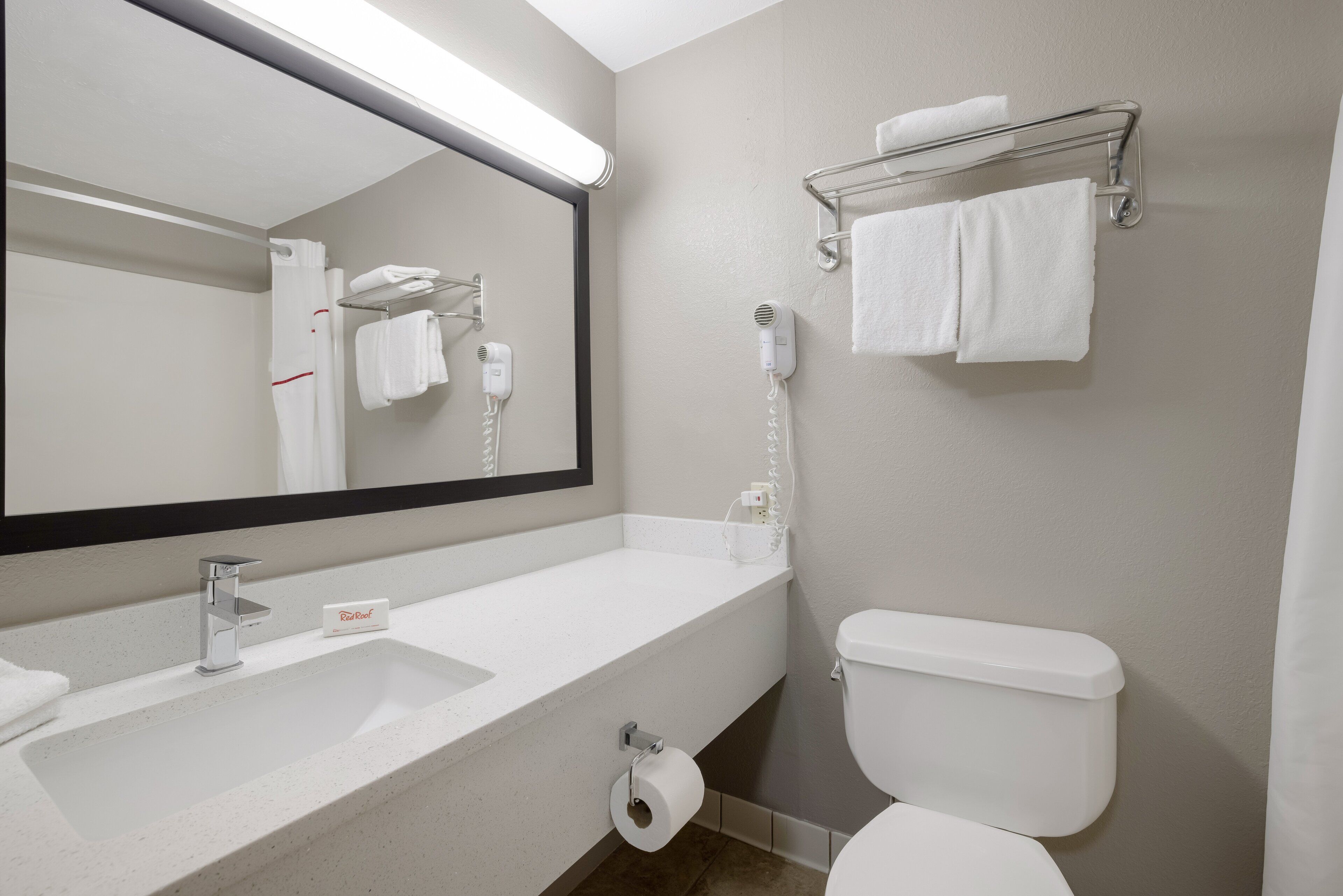 hair dryer, towels, soap, shampoo