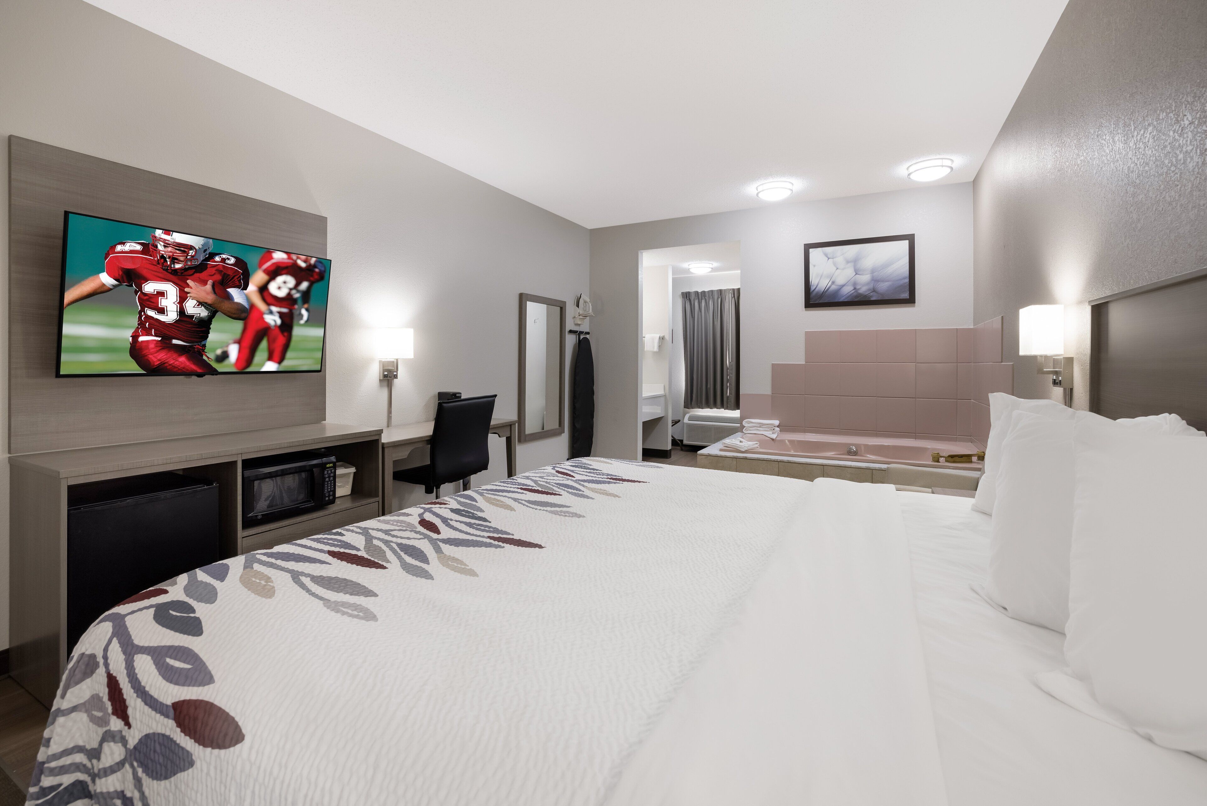 superior room, 1 king bed, non smoking, jetted tub | 1 bedroom, desk, laptop workspace, blackout curtains