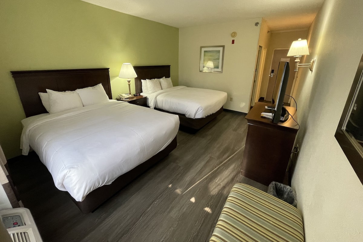 Suite, Multiple Beds, Non Smoking (Upgrade) | Blackout drapes, iron/ironing board, free WiFi, bed sheets