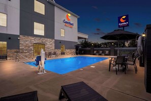 Outdoor pool, open 7:00 AM to 9:00 PM, pool umbrellas