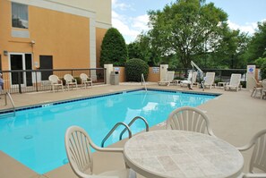 Seasonal outdoor pool, pool umbrellas, pool loungers