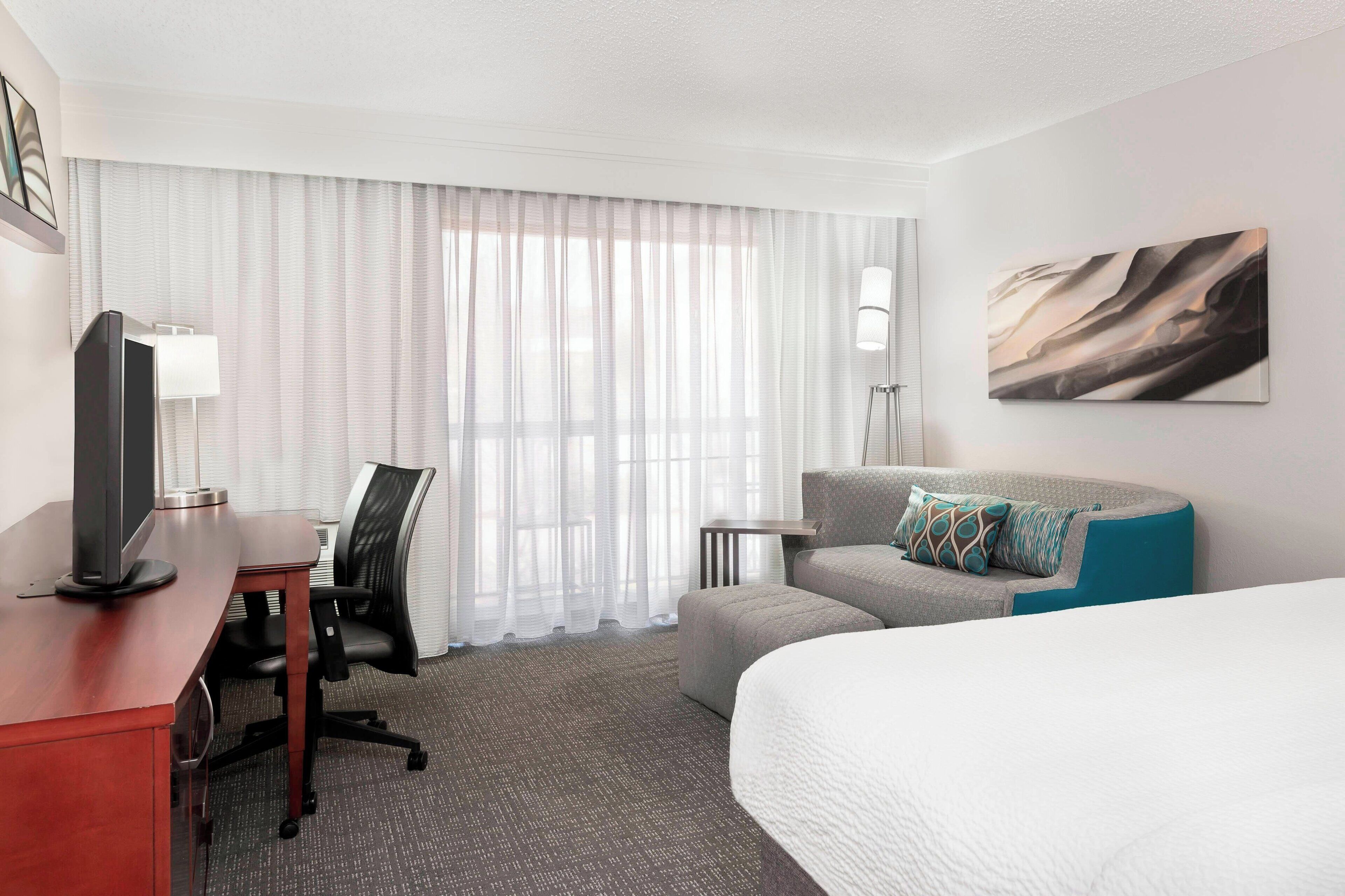 hypo-allergenic bedding, desk, blackout curtains, iron/ironing board