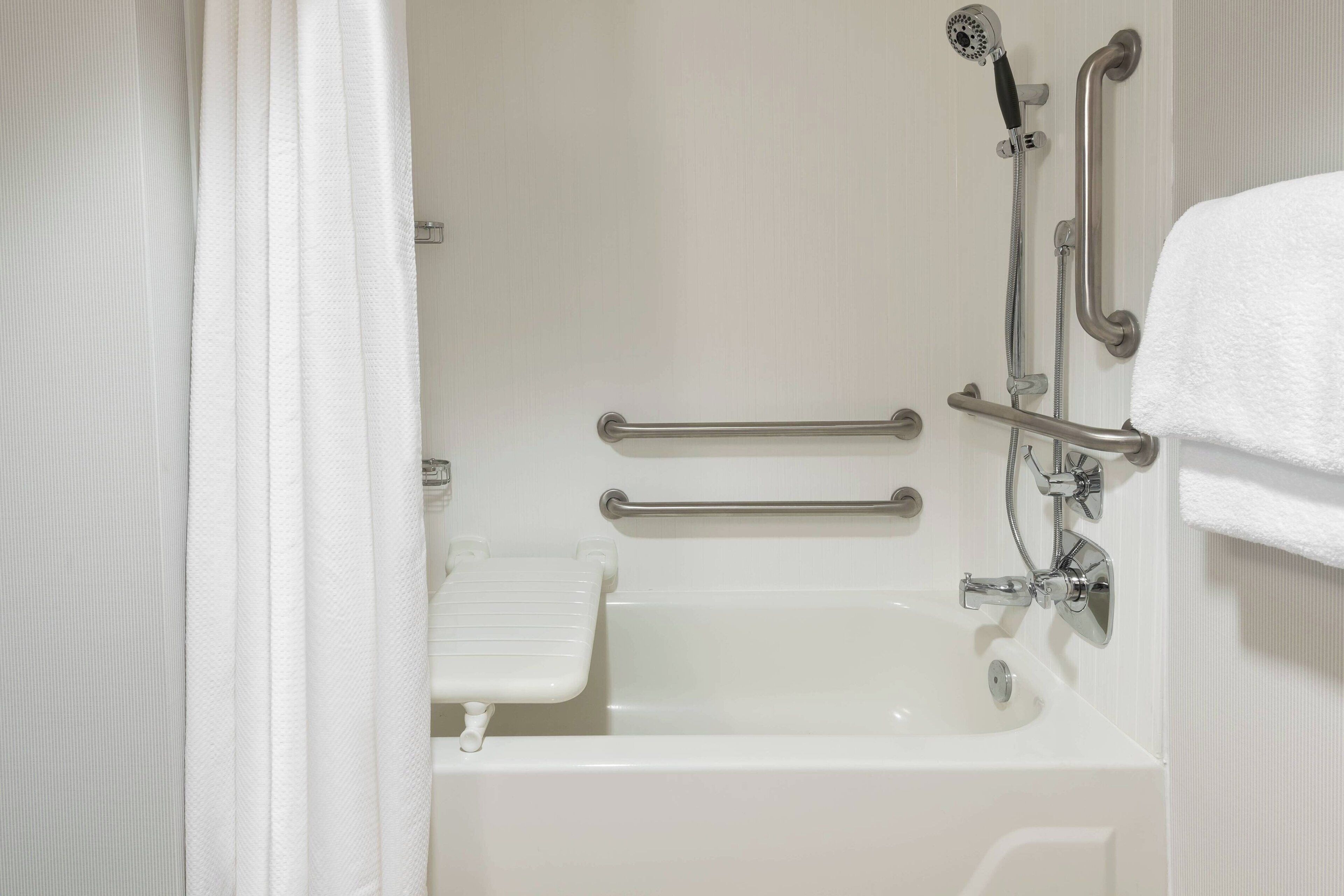 combined shower/bathtub, free toiletries, hair dryer, towels