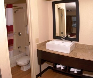 Combined shower/bathtub, hair dryer, towels, soap