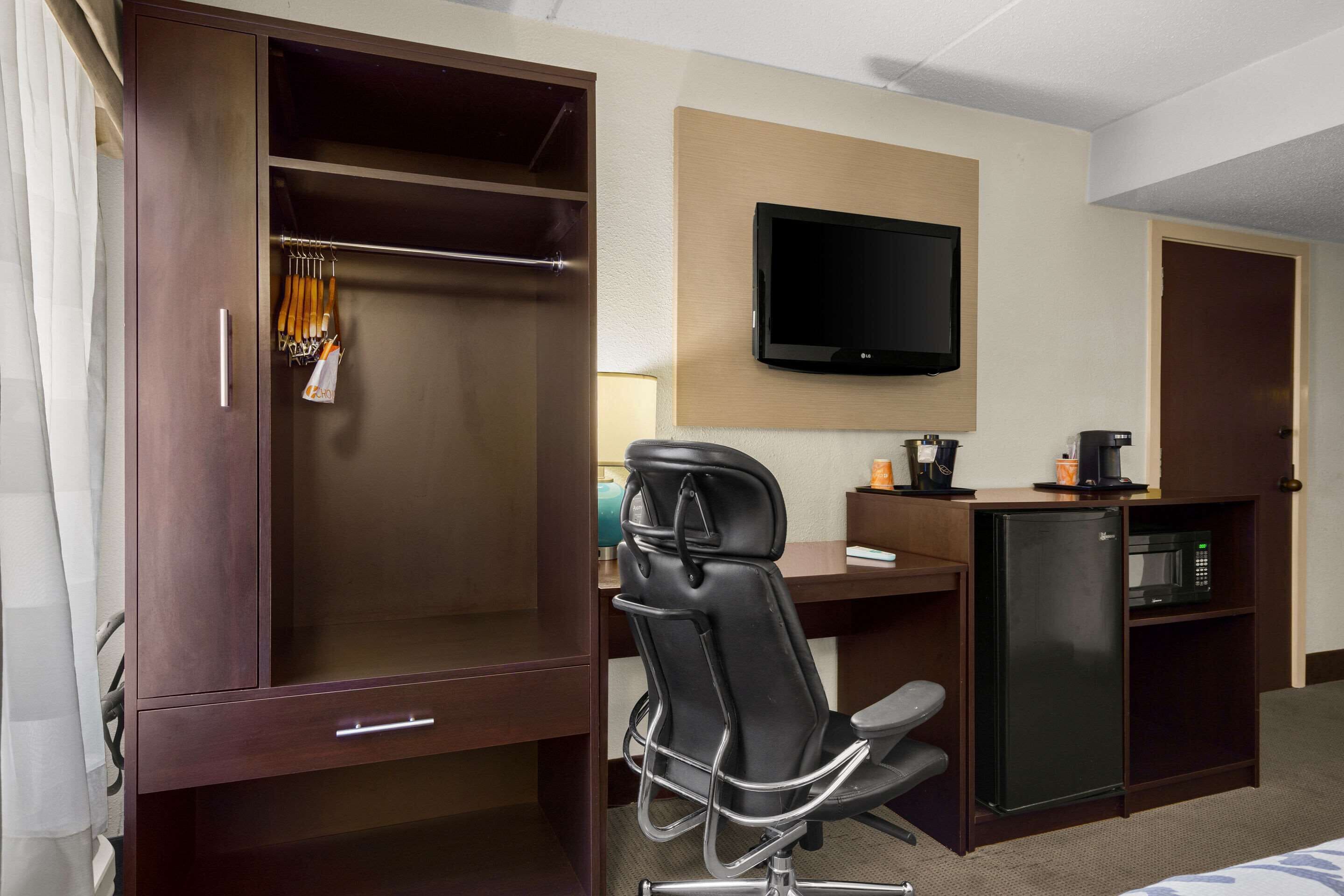 premium bedding, desk, laptop workspace, blackout curtains