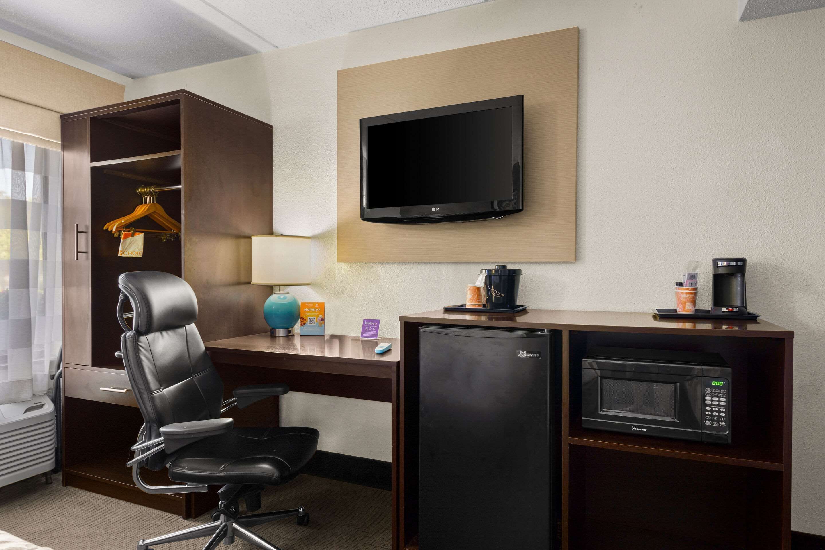 premium bedding, desk, laptop workspace, blackout curtains