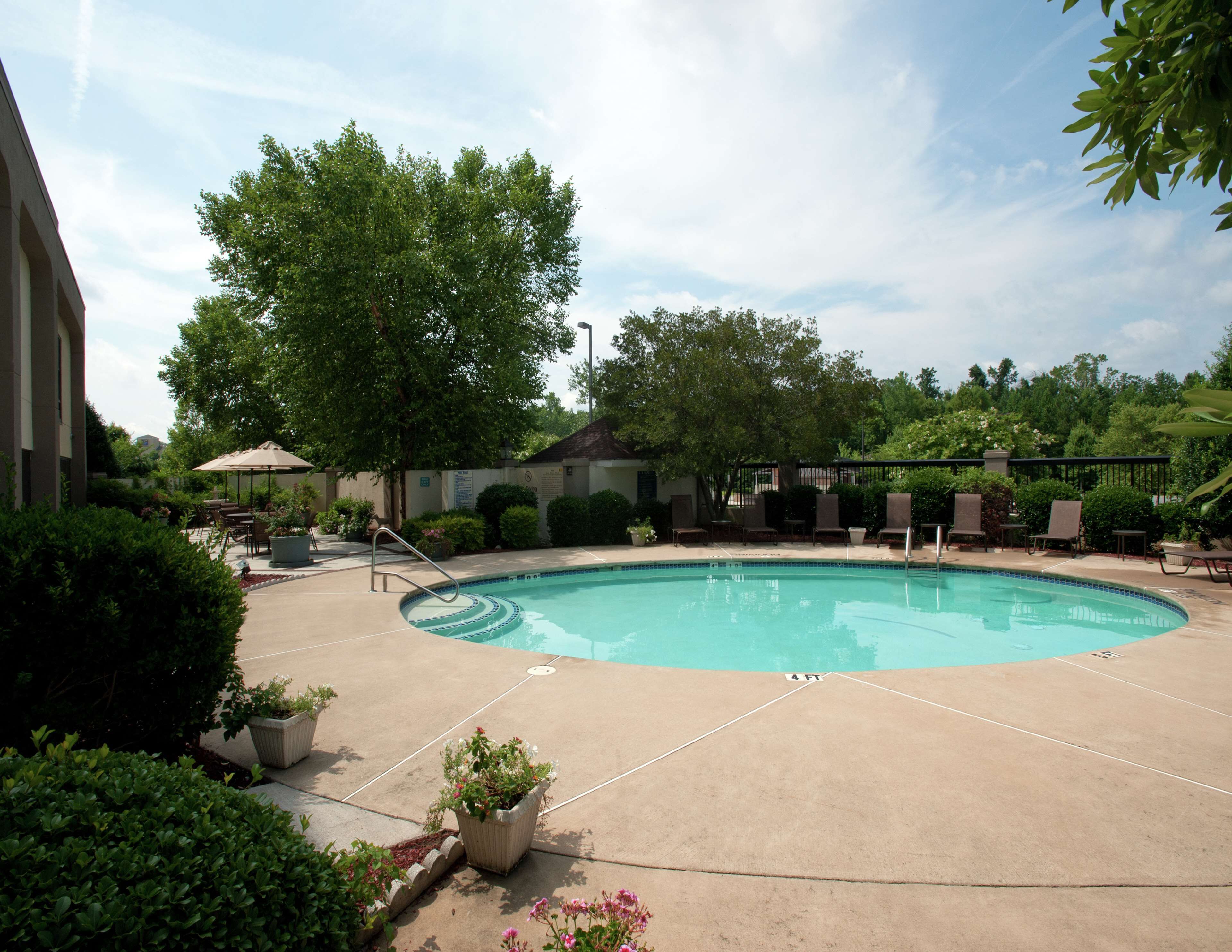 seasonal outdoor pool, open 9:00 am to 9:00 pm, pool umbrellas