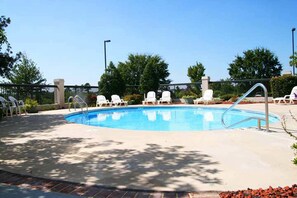 Seasonal outdoor pool, open 9:00 AM to 9:00 PM, pool umbrellas