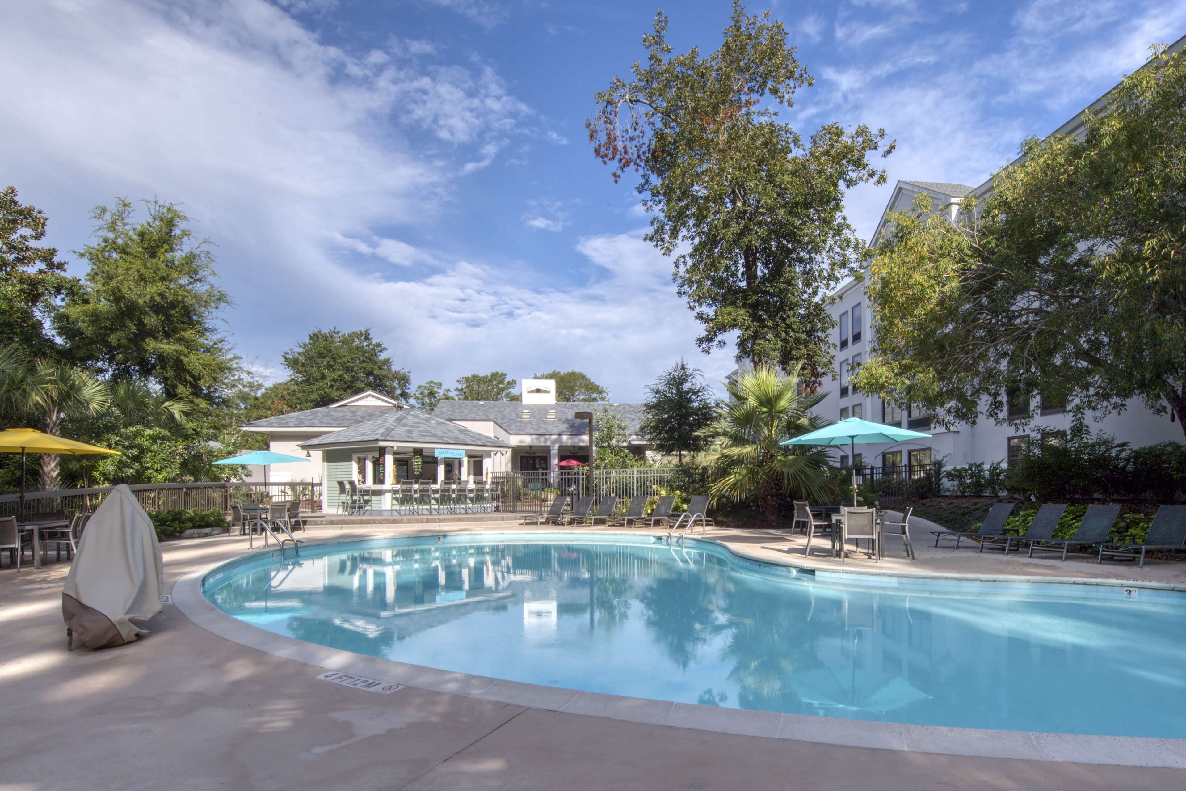 outdoor pool, open 9:00 am to 10:00 pm, pool umbrellas, pool loungers