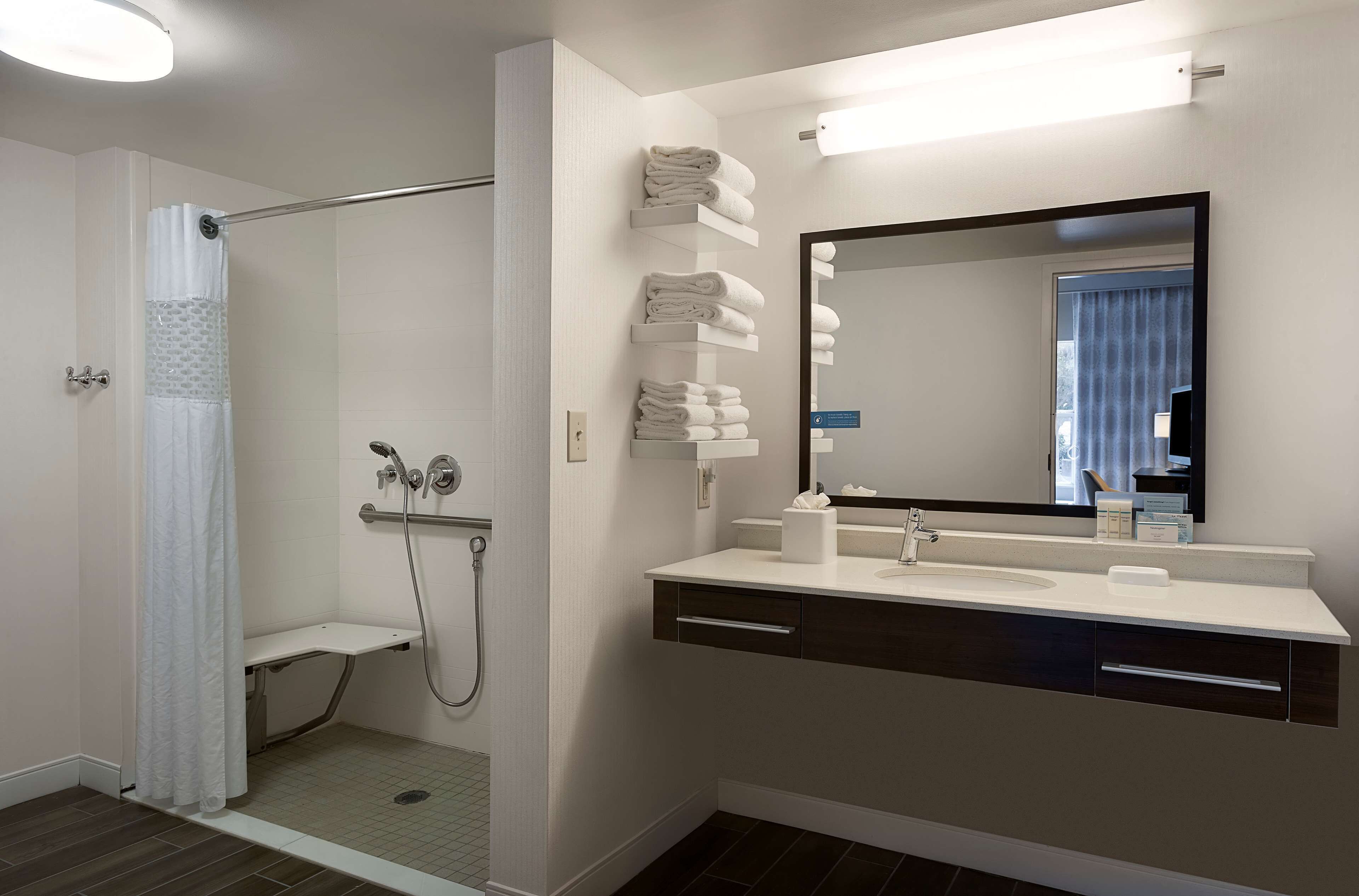 suite, 1 king bed, accessible, non smoking (mobility & hearing, roll-in shower) | bathroom | combined shower/bathtub, free toiletries, hair dryer, towels