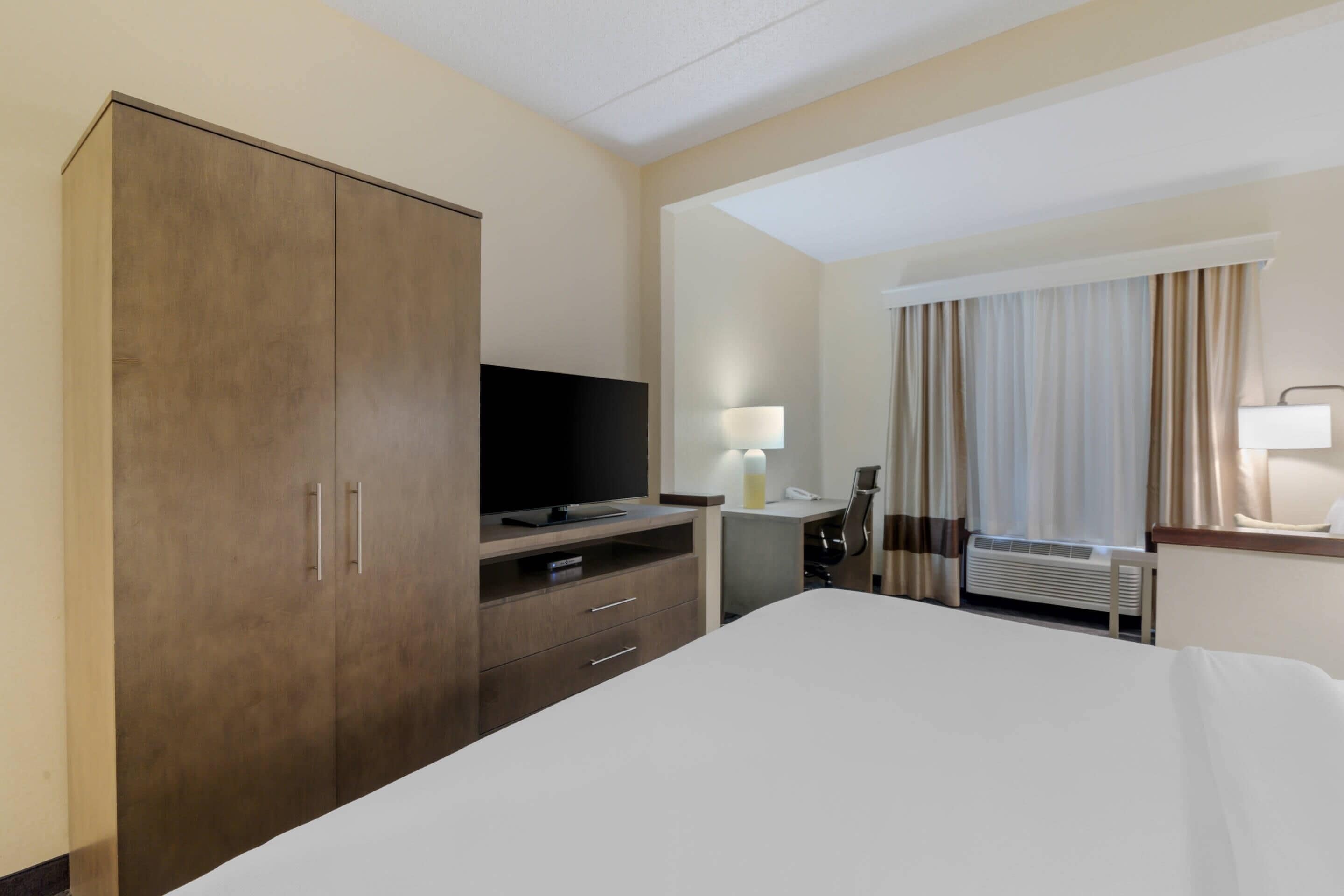 desk, laptop workspace, iron/ironing board, free cots/infant beds