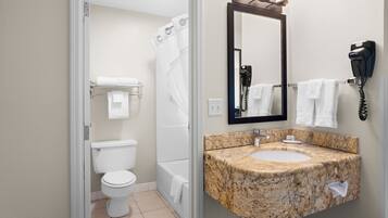 Deluxe Room, 1 King Bed (KING NON-SMOKING) | Bathroom | Free toiletries, hair dryer, towels, soap