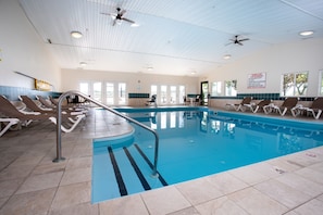 Indoor pool, open 7 AM to 10 PM, sun loungers