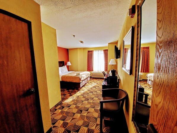Desk, blackout drapes, iron/ironing board, rollaway beds