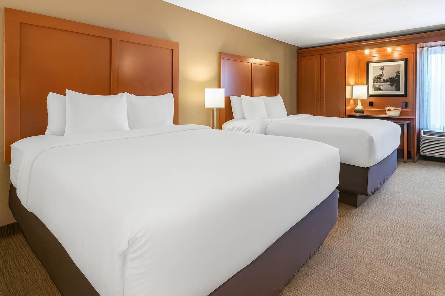 Room, 2 Queen Beds, Non Smoking | Hypo-allergenic bedding, desk, iron/ironing board