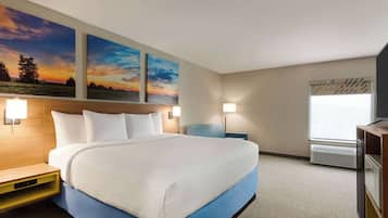 Desk, laptop workspace, blackout drapes, iron/ironing board