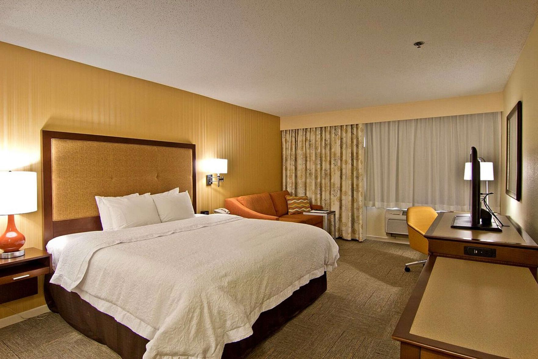 Premium bedding, pillow-top beds, desk, blackout curtains
