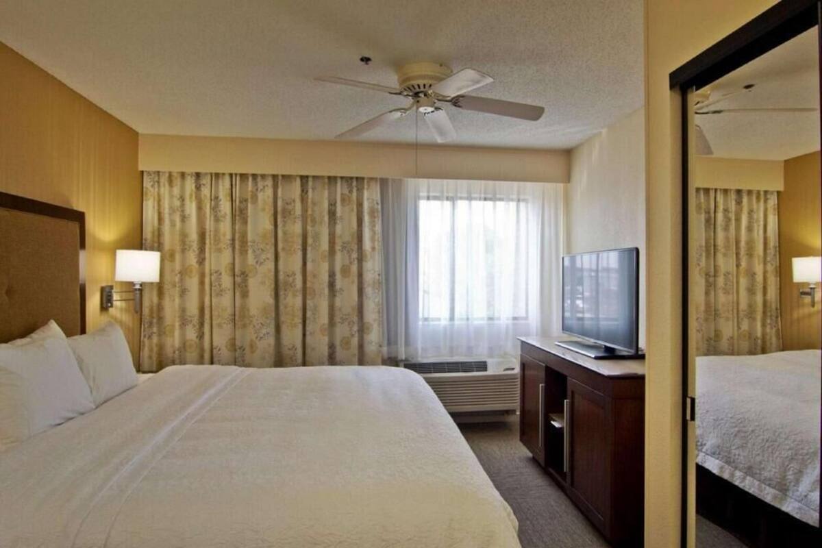 Premium bedding, pillow-top beds, desk, blackout curtains