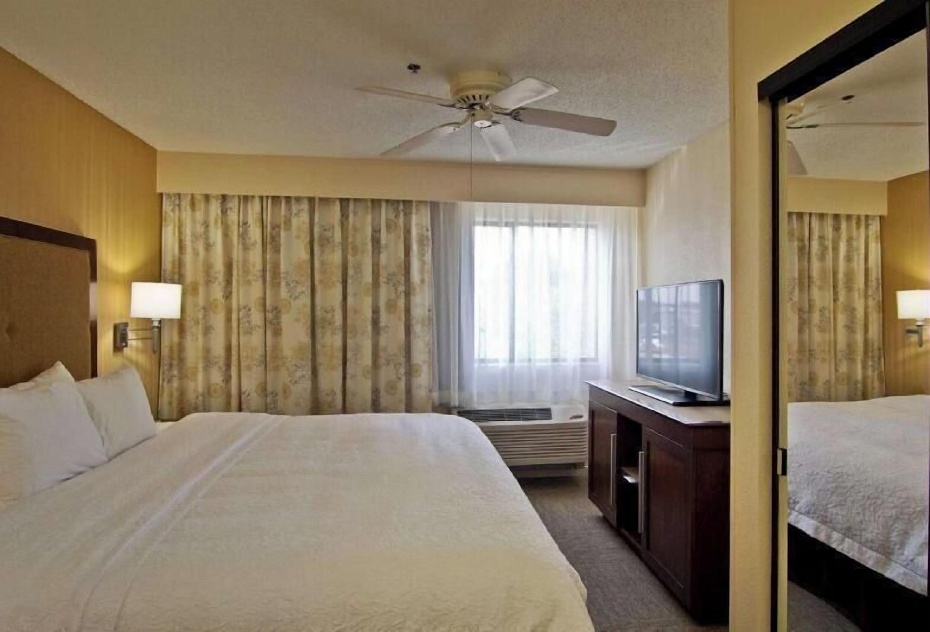Premium bedding, pillow-top beds, desk, blackout curtains