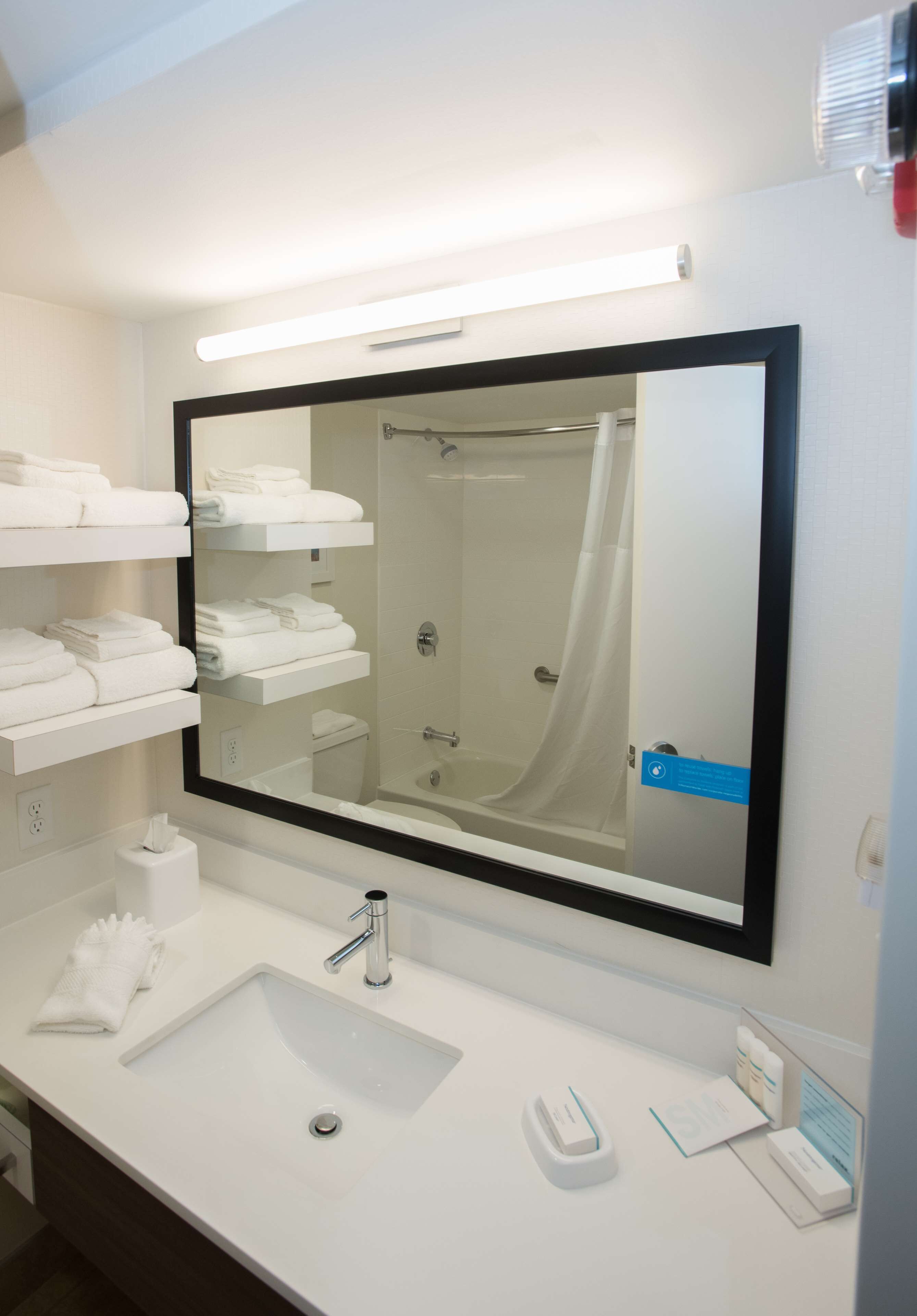 combined shower/bathtub, free toiletries, hair dryer, towels