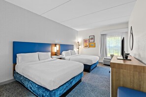 A hotel room with two beds, a desk, a chair, a TV, and framed pictures on the wall. - Hampton Inn by Hilton Youngstown-West I-80 (Austintown)