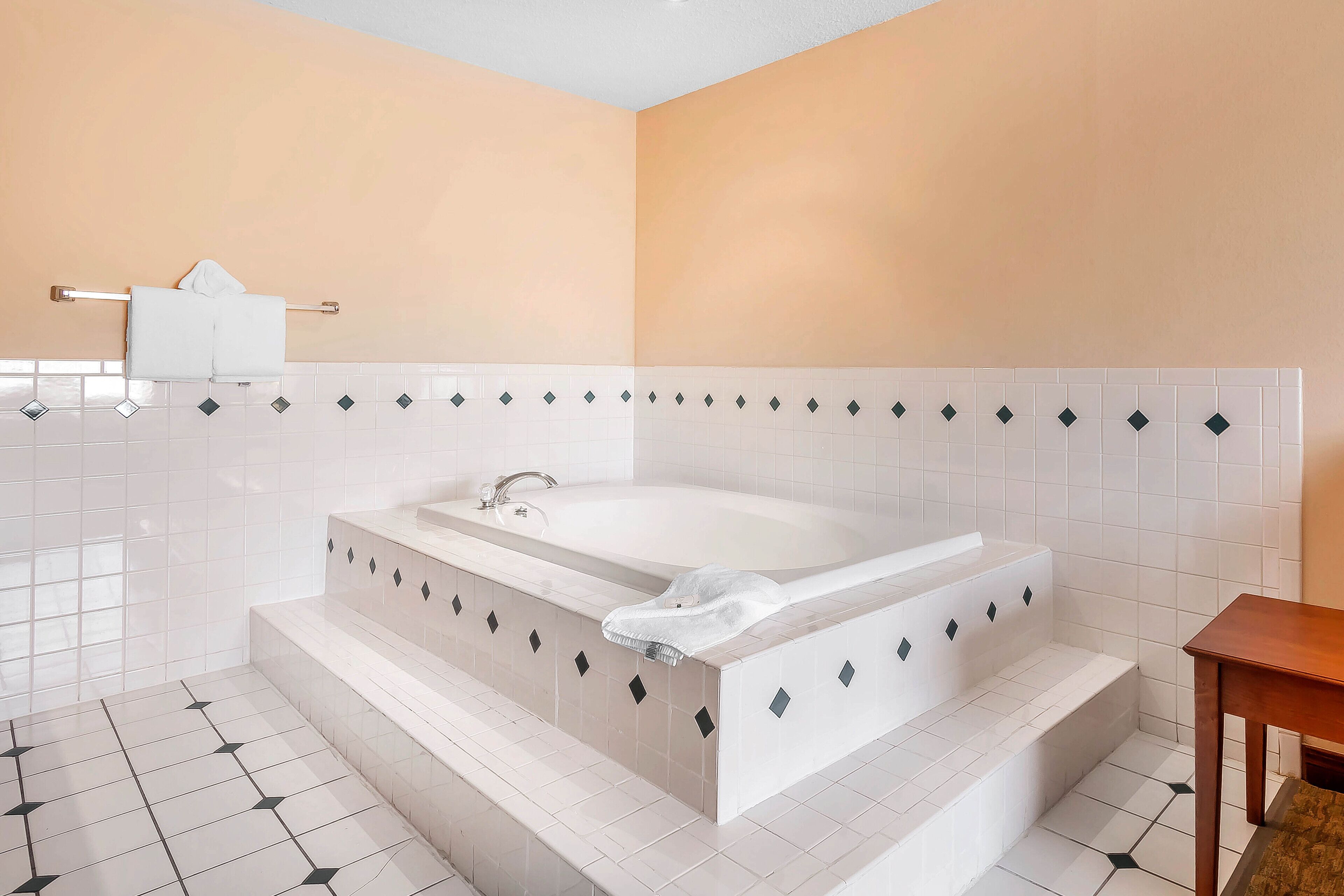 suite, 1 king bed, non smoking | in-room safe, desk, iron/ironing board, free cots/infant beds