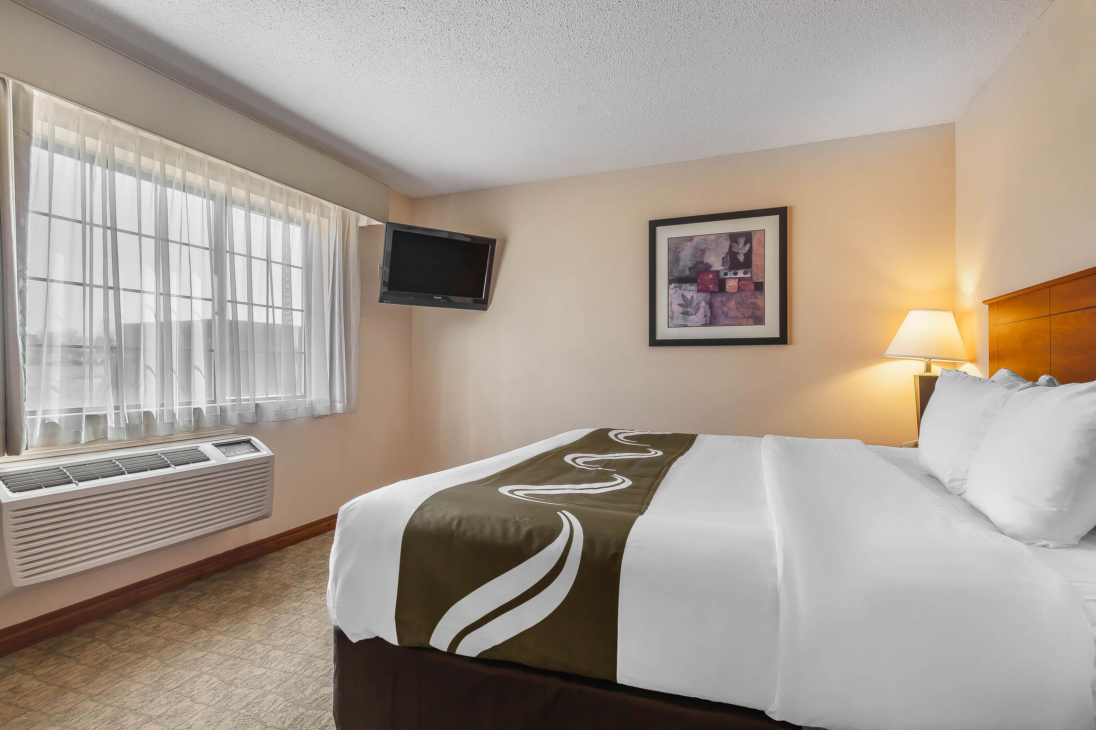 suite, 1 king bed, non smoking | in-room safe, desk, iron/ironing board, free cots/infant beds