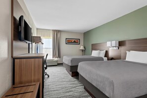 Työpöytä, kannettavalle tietokoneelle sopiva työtila, pimennysverhot