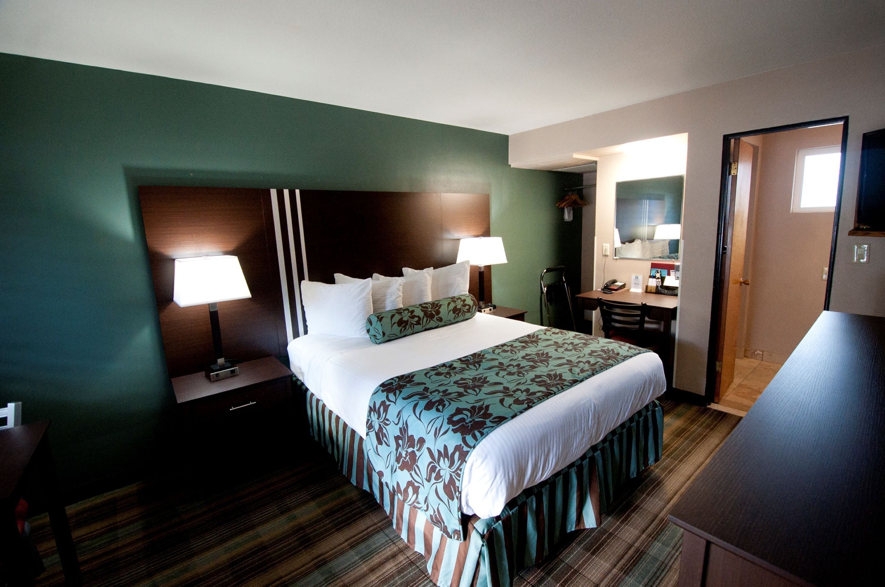 Desk, blackout curtains, iron/ironing board, WiFi