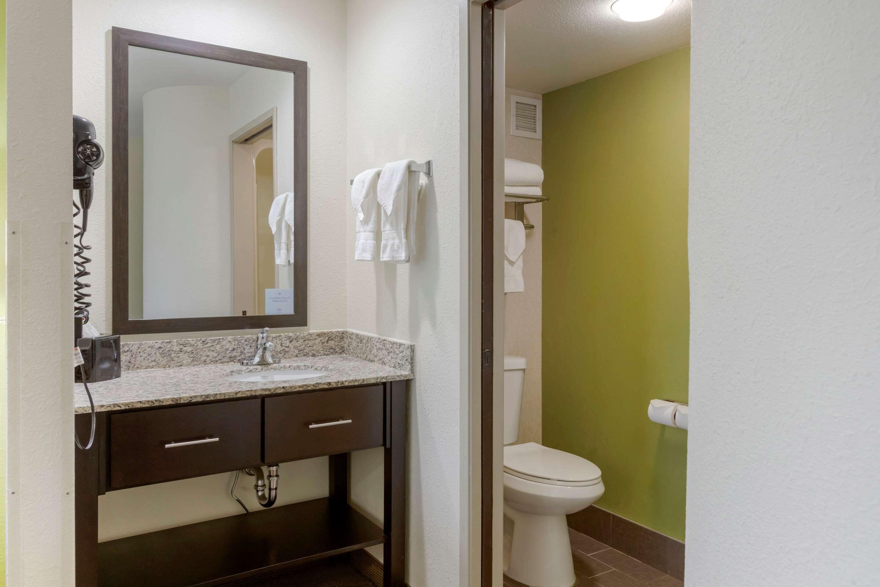 standard room, 2 queen beds, non smoking | bathroom | shower, rainfall showerhead, hair dryer, towels