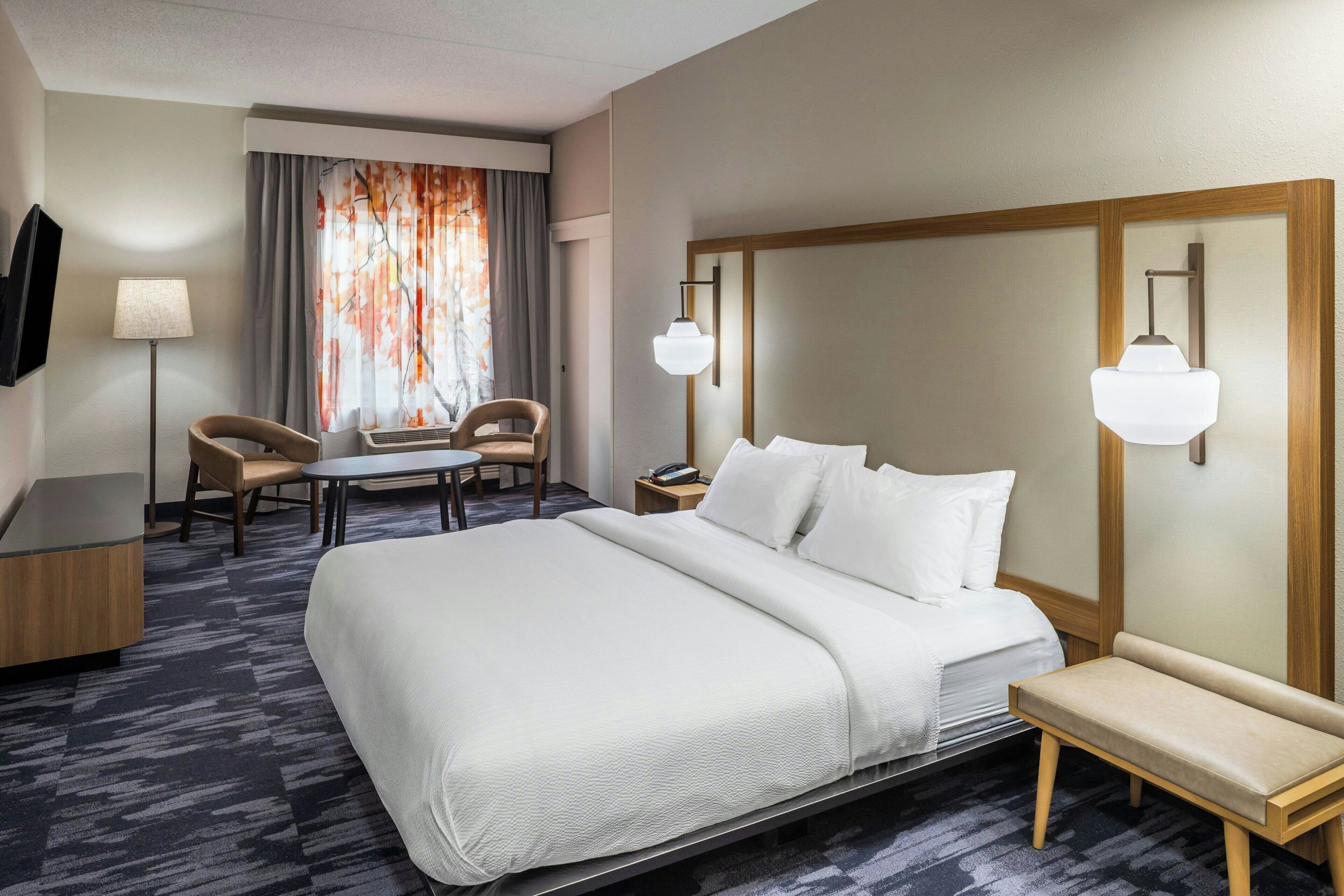 premium bedding, desk, laptop workspace, blackout curtains