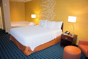 Premium bedding, desk, laptop workspace, blackout curtains