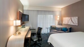 Desk, laptop workspace, blackout curtains, iron/ironing board