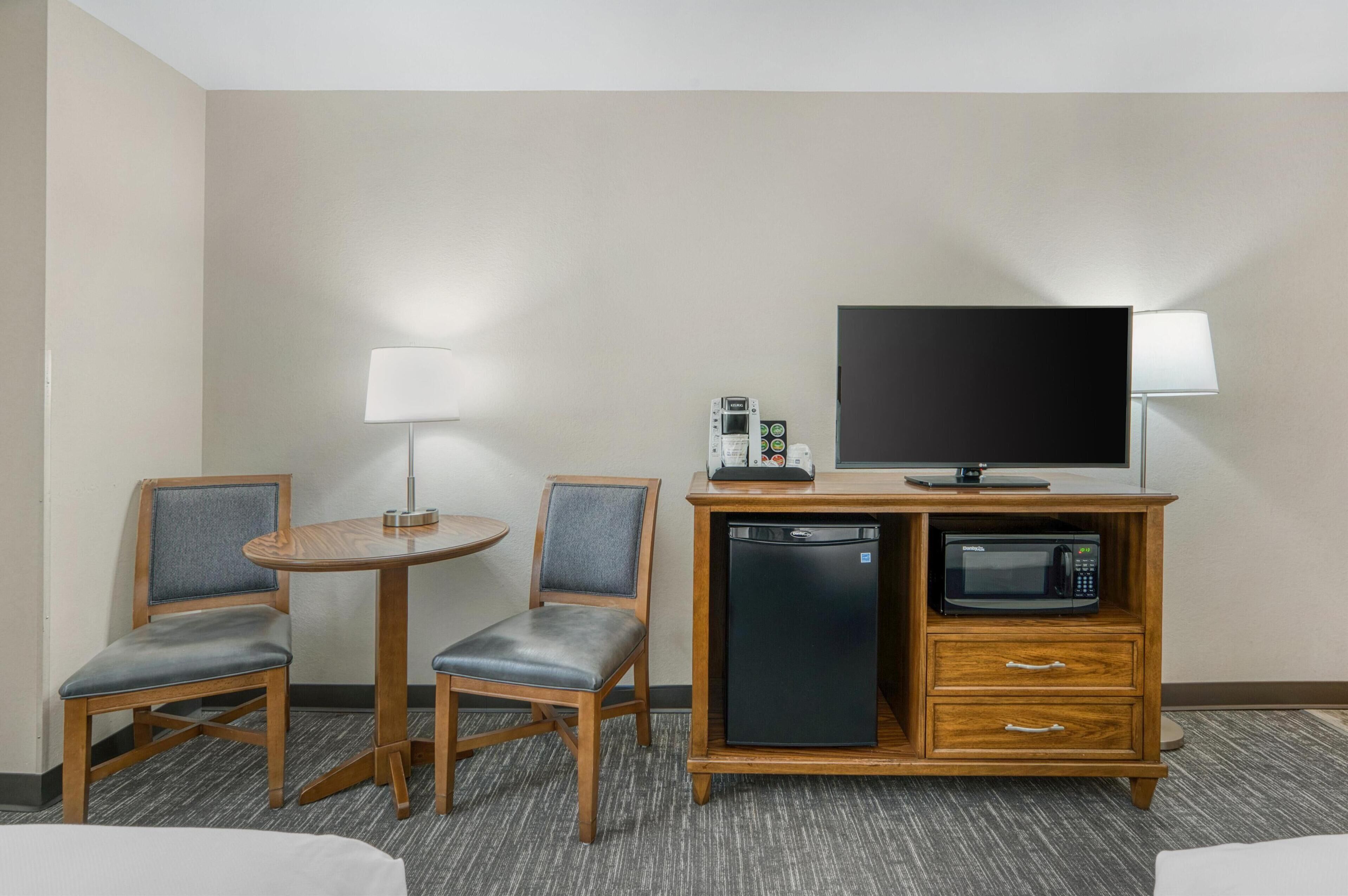 Laptop workspace, blackout drapes, iron/ironing board, cribs (free)