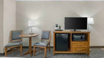 Laptop workspace, blackout drapes, iron/ironing board, cribs (free)