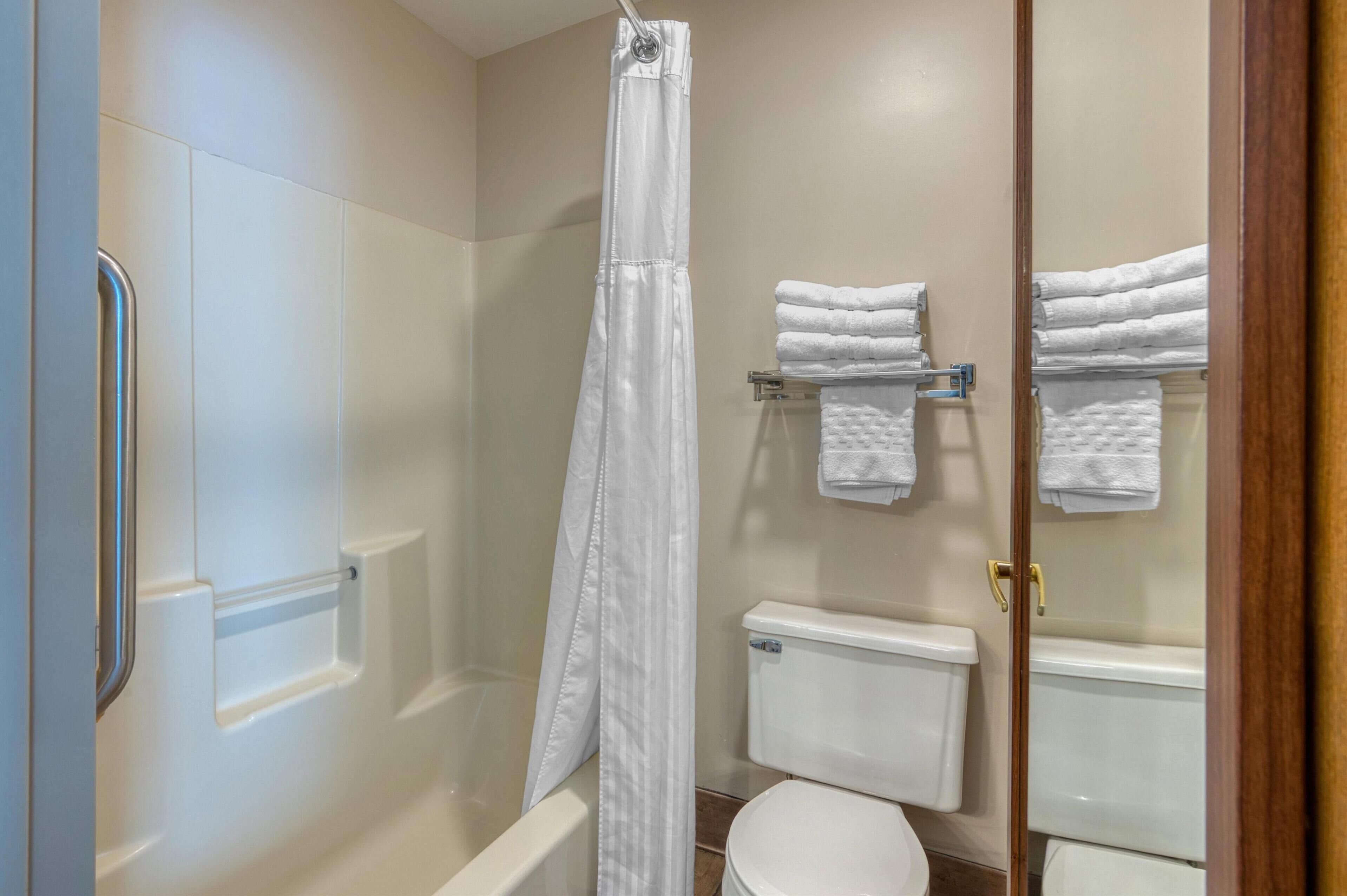 standard room, 2 queen beds, non smoking, refrigerator & microwave (with sofabed) | bathroom | combined shower/bathtub, eco-friendly toiletries, hair dryer, towels