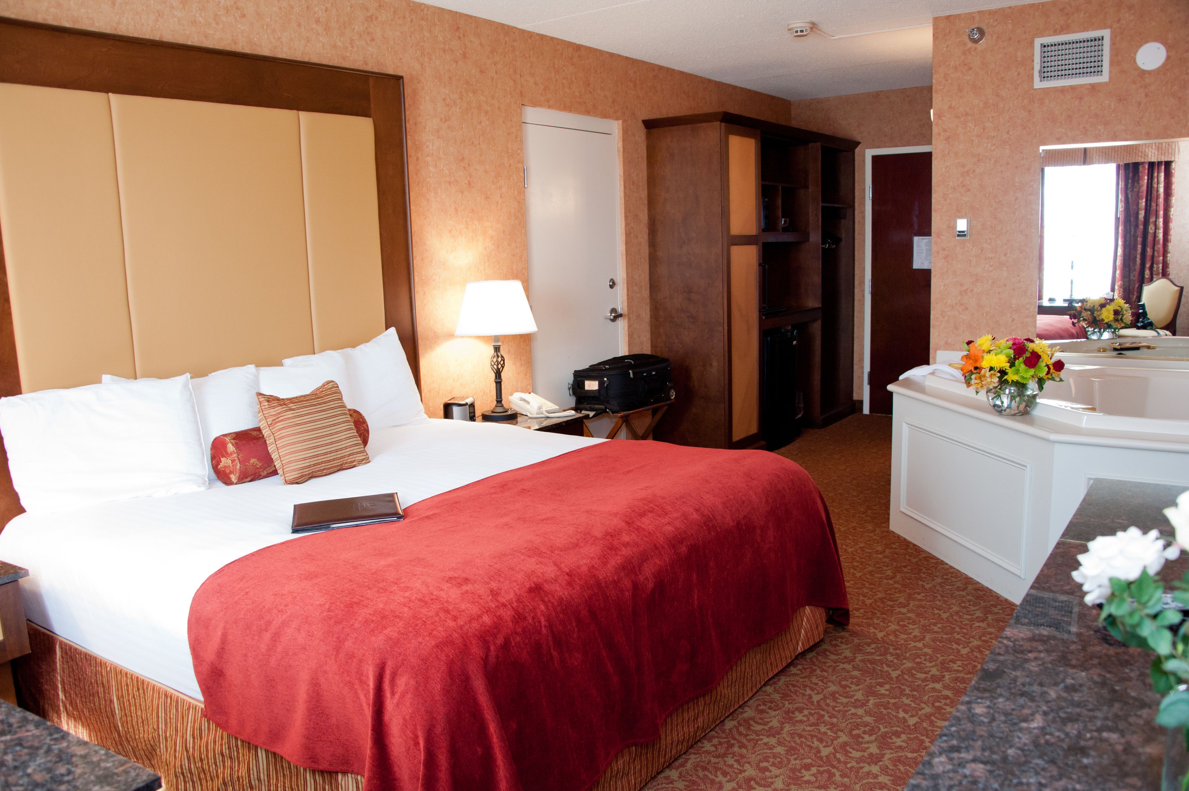 premium bedding, pillow-top beds, desk, blackout curtains